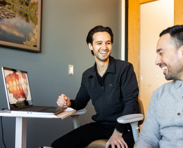 In the event of a dental emergency, our office offers the help you need Monica our staff member talking with Jake