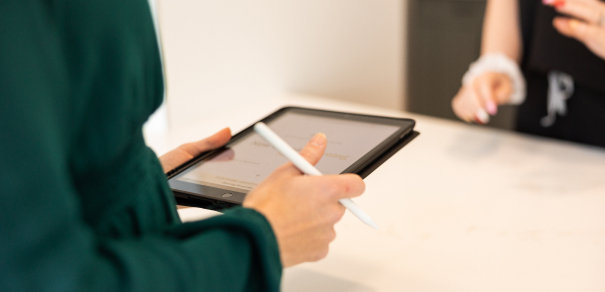 In the event of a dental emergency, our office offers the help you need Monica our staff member talking with Jake