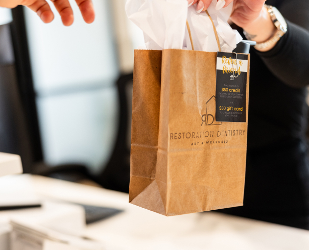 In the event of a dental emergency, our office offers the help you need Monica our staff member talking with Jake