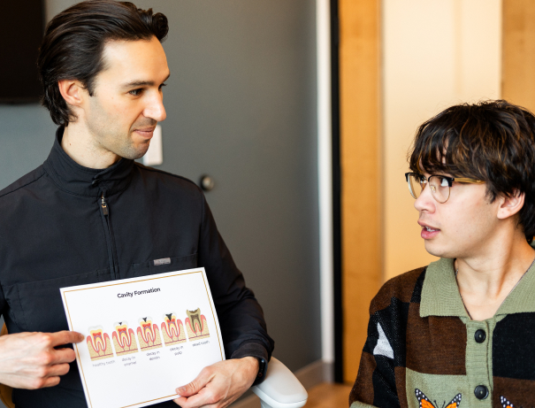 In the event of a dental emergency, our office offers the help you need Monica our staff member talking with Jake